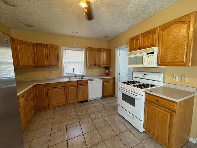Building Photo - Spacious Pet OK 3-Bedroom Rental W/ Modern...