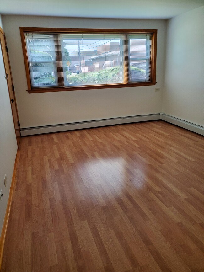 Living Room to Windows - 7130 W Jarvis Ave