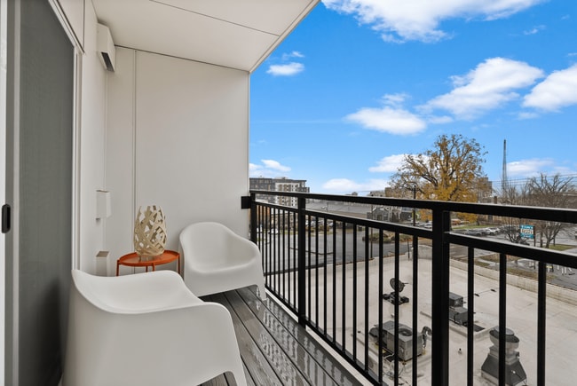 Step outside and enjoy fresh air and elevated city views from your private balcony. - The Ruby