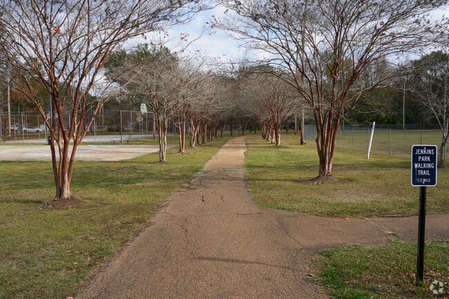 Jenkins Park features a scenic walking trail for outdoor enjoyment and leisurely strolls.