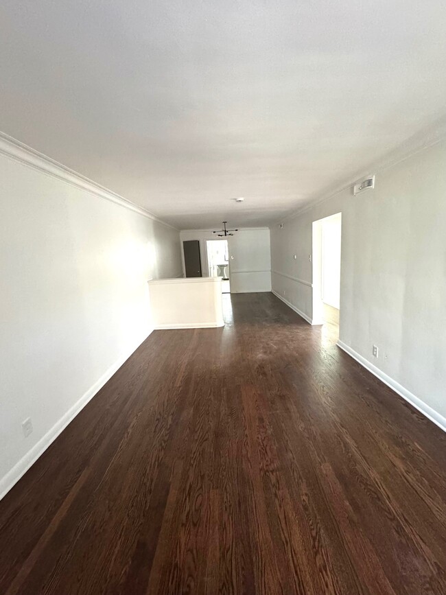 Refinished hardwood floors - 612 S Hanley Rd