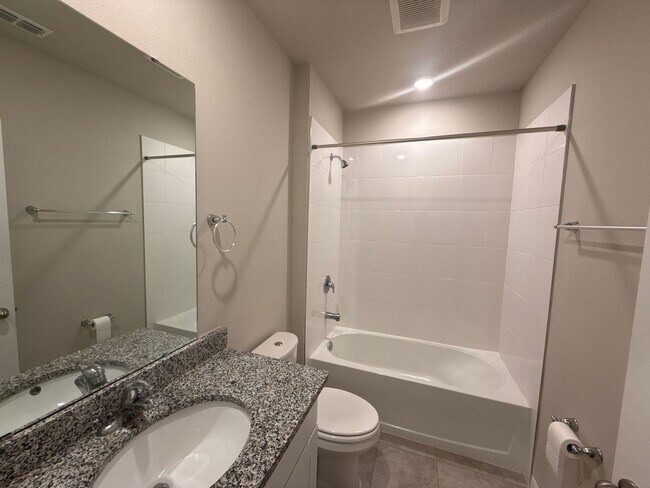 Building Photo - Stunning 4-bedroom, 3-bathroom, 2-stall garage, home. The only thing missing is you.