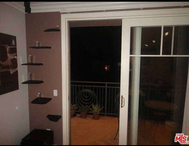 One of 2 balconies. - 430 N Oakhurst Dr