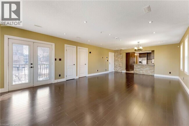 Building Photo - 561 Queen St S