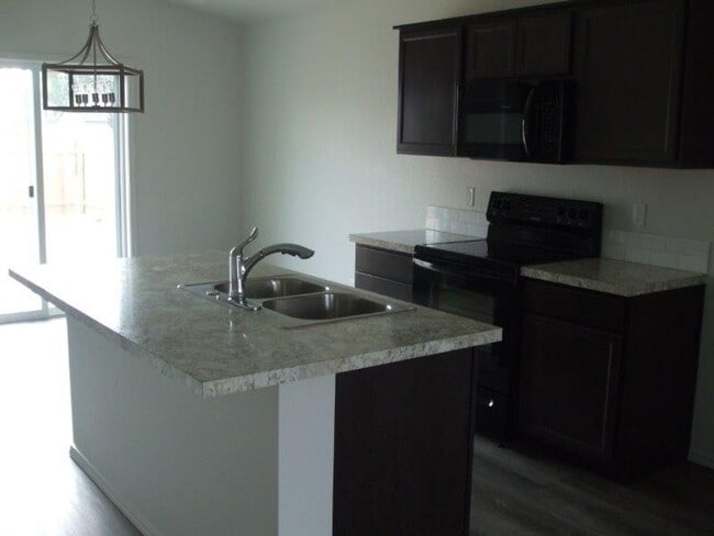 Building Photo - NICE 3 bed 2 bath 2 car garage avail aroun...