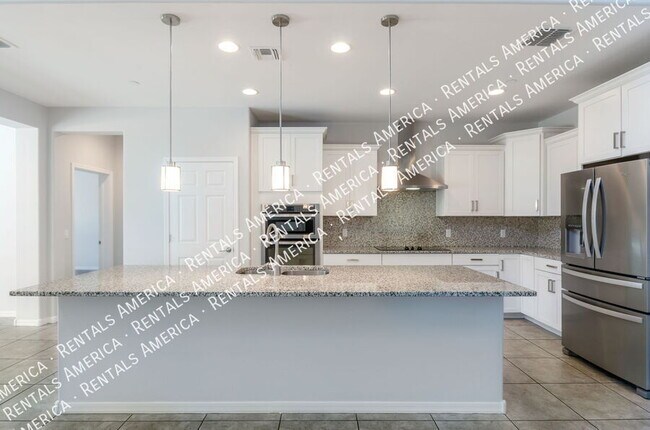 Foto del edificio - 5768 S Tiger Lily Pl