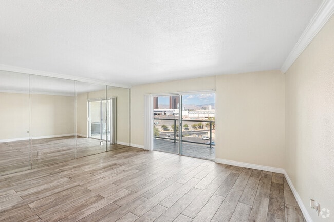 3BR, 2BA - 1,460SF - Living Room - Country Club Towers