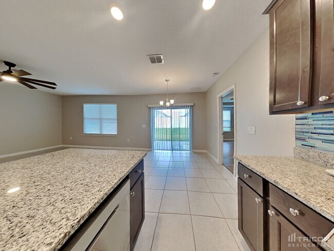 Building Photo - 15271 Aquarius Way Mascotte FL