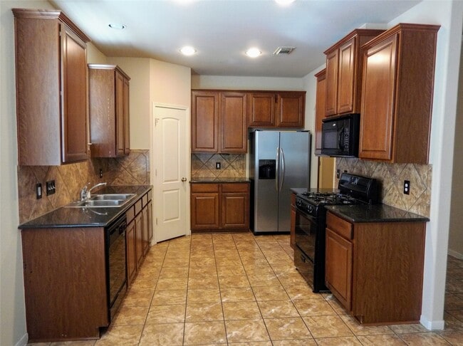 Foto del edificio - 14435 Long Meadow Dr