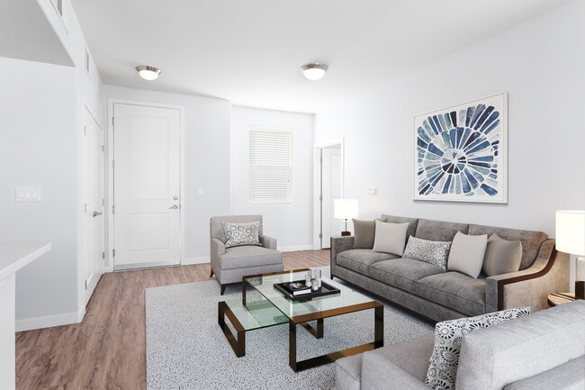 Spacious living rooms designed for comfort and style. - Vue at Centennial