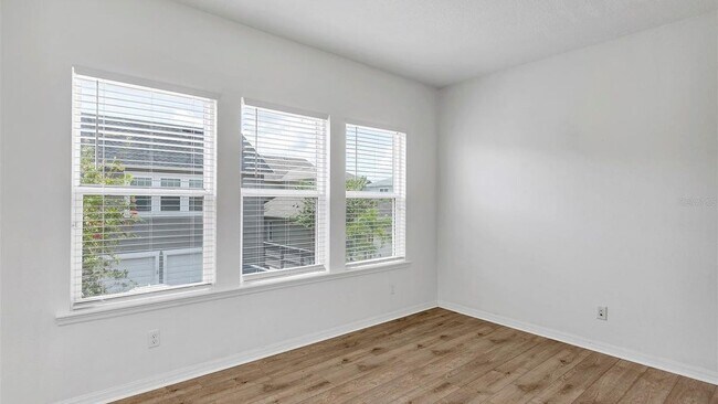 Foto del edificio - 8558 Tavistock Lakes Blvd