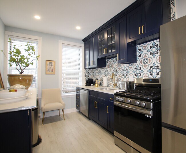 Building Photo - 60-30 Putnam Ave