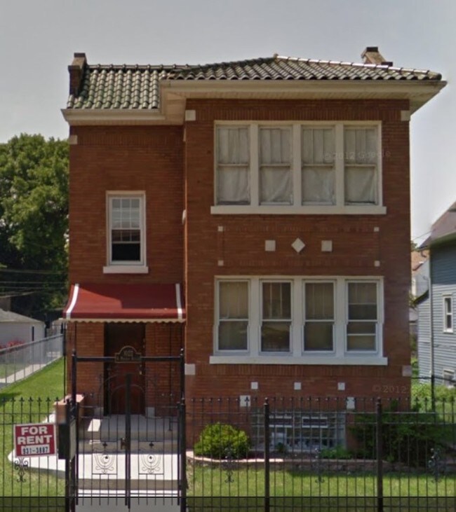 BUILDING FRONT - 1022 N Menard Ave