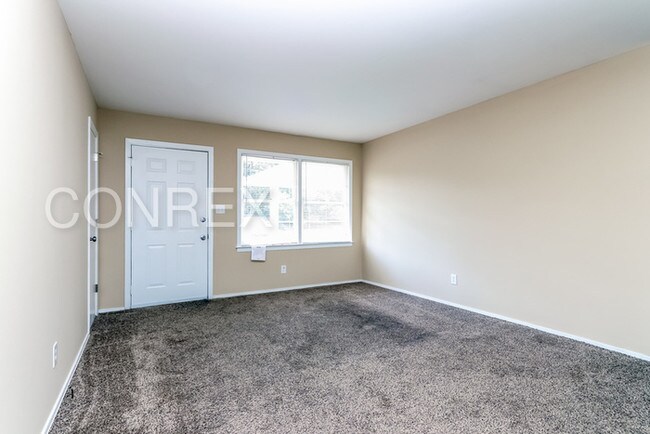 Building Photo - Charming Three Bedroom with Carport