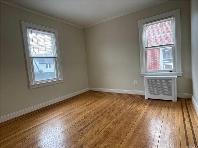 Building Photo - 70-16 Loubet St