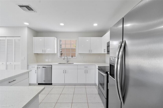 Foto del edificio - 4 br, 2.5 bath House - 7121 NW 32nd St