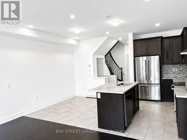 Building Photo - 103 Drizzel Cres