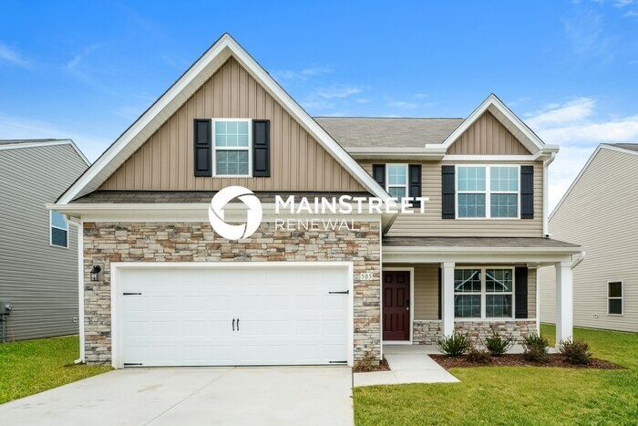 Foto principal - 4 Bedroom Pet-Friendly Home in Zebulon, NC with Main Street Renewal