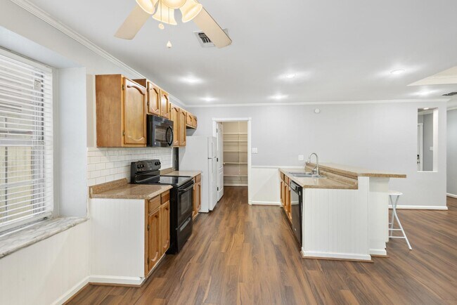 Foto del edificio - 4823 Blue Heron Dr