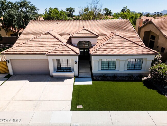 Building Photo - 5827 E Aire Libre Ave