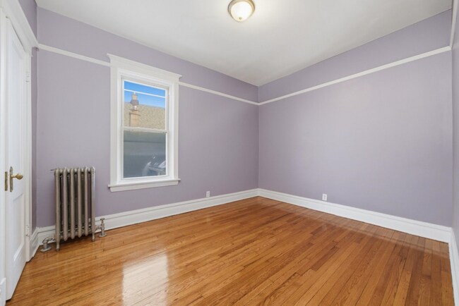 Building Photo - 7442 S Langley Ave