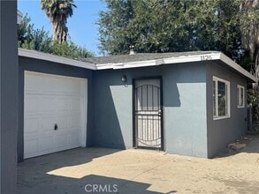 Building Photo - 1124 Ramona Ave N