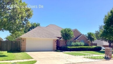 Building Photo - 7316 Hidden Oaks Dr