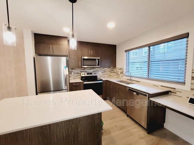 Building Photo - 3025-3151 151 Avenue Northwest
