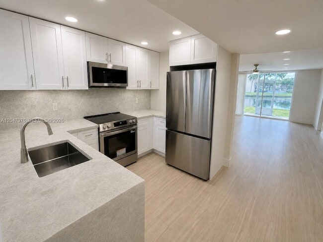 Photo - 8600 Sunrise Lakes Blvd Apartment