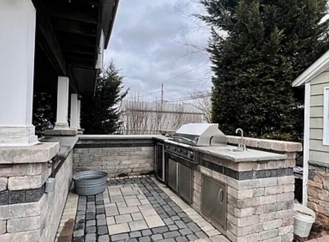 Outdoor custom grill/kitchen is included - 133 Wilfred Blvd