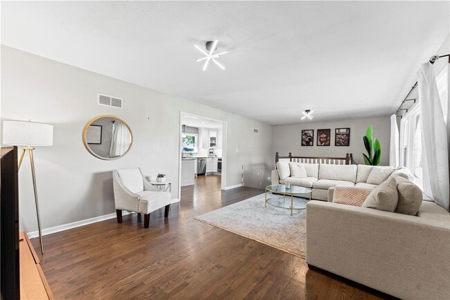 Large Living Room with wood floors - 7635 W 114th Ter