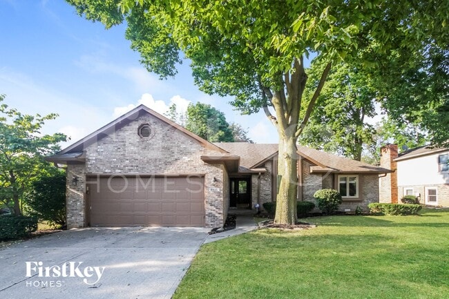 Building Photo - 8535 Spend a Buck Dr