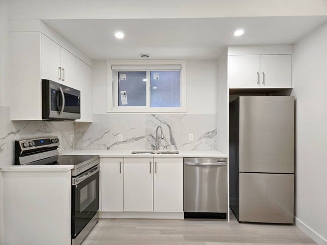 Building Photo - 6123-6133 33 Ave NW