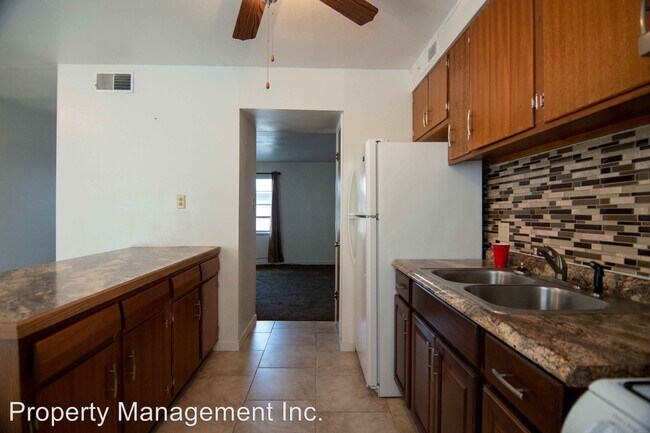 Foto del edificio - 403 W 9th St