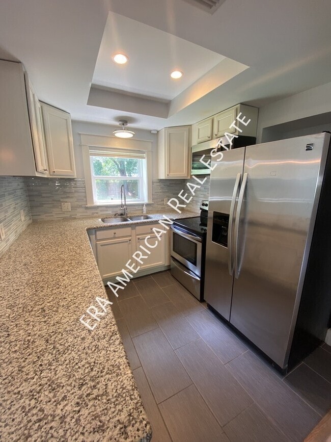Building Photo - 212 Ajax Dr NW