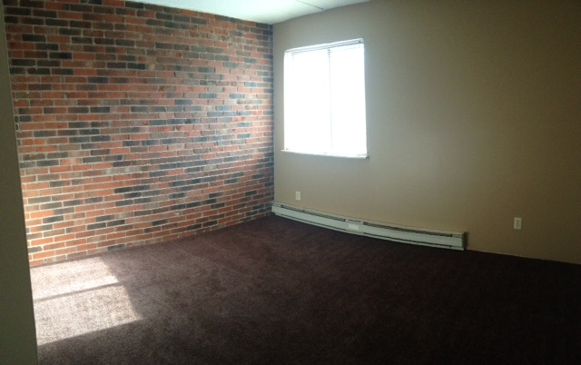 Natural Brick Wall - Silverbirch Apartments