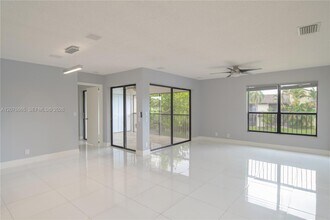 Building Photo - 3745 Cocoplum Cir