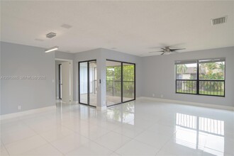Building Photo - 3745 Cocoplum Cir