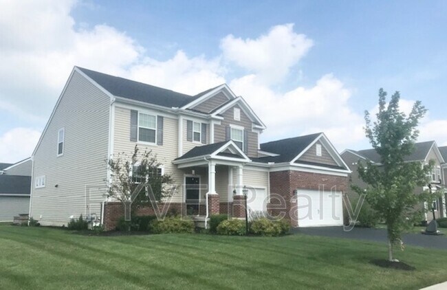 Building Photo - 9390 Woodbine Way