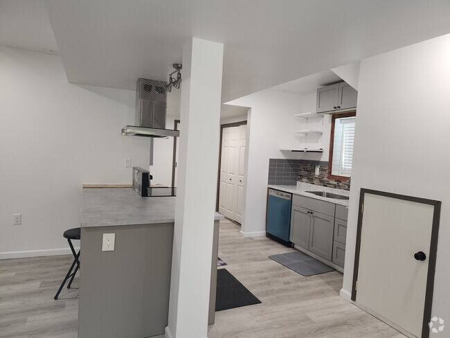 Open kicken concept and a huge island - 60 Manors Mill Rd