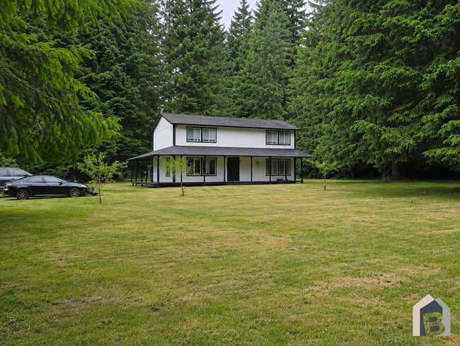Nestled on a sunny 1.25 beautiful acres with mature evergreens - 20981 Port Gamble Rd NE