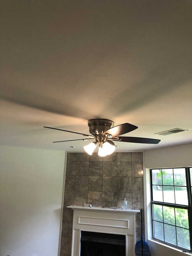 New ceiling fan in living room - 1003 Pine Tree Ct