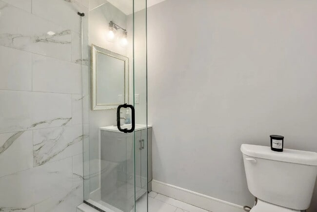 Full bath on 1st floor - 169 W 9th St