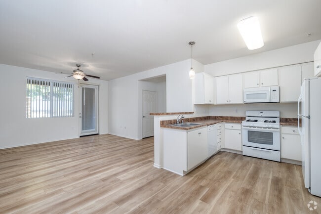 3BR, 2BA – 1,154SF - Kitchen/Living Room - Avila Apartment Homes