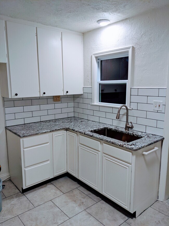 Granite Countertops, Oversized Sink, Pull Down Faucet, New Fridge, New Gas Range, New Windows - 2011 N Burns