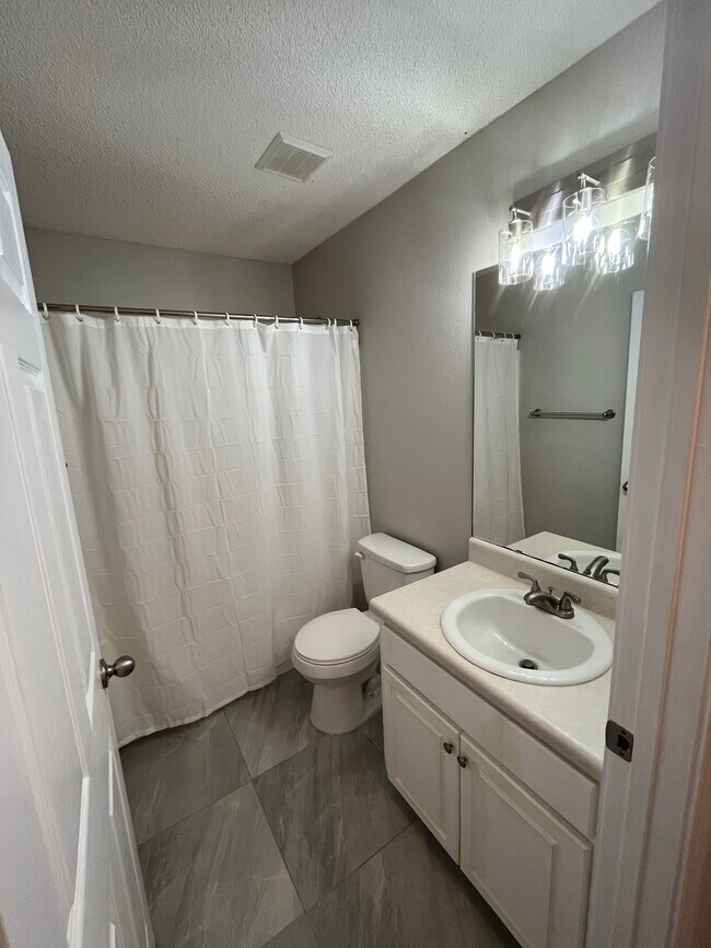 Guest Bathroom - 8107 Hartington Dr