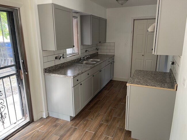 Kitchen. Will provide appliances if necessary. - 6904 S Harvard Ave
