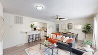 Located at 505 Riverbend Pkwy in Athens, GA, this single-floor residence offers six bedrooms and four bathrooms, making it an ideal option for those seeking ample shared living space. The open-concept layout connects a bright living room—featuring wood-look flooring, large windows with natural light, a ceiling fan, and a textured ceiling—to a well-appointed kitchen outfitted with white shaker cabinetry, stainless steel appliances including a dishwasher and range, a double sink with brushed nickel fixtures, and a peninsula counter for additional workspace and seating.

Each bedroom is carpeted and equipped with a ceiling fan and window, providing a comfortable, private retreat. The primary bedroom includes a generously sized walk-in closet with wire shelving and full hanging rod storage. The bathrooms are finished with wood-look tile flooring, white vanity cabinetry, dual-sink countertops, and bright vanity lighting above large mirrors. A dedicated in-unit laundry room houses a full-size washer and dryer. Throughout the residence, a consistent palette of white walls and light flooring creates a clean, cohesive aesthetic well-suited for everyday living.