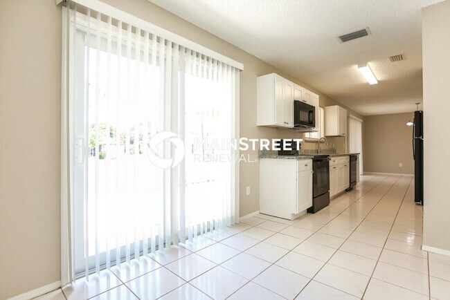 Building Photo - 3 Bedroom Pet-Friendly Home in PORT CHARLOTTE, FL with Main Street Renewal