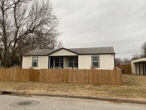 Building Photo - 1302 N 73rd E Ave
